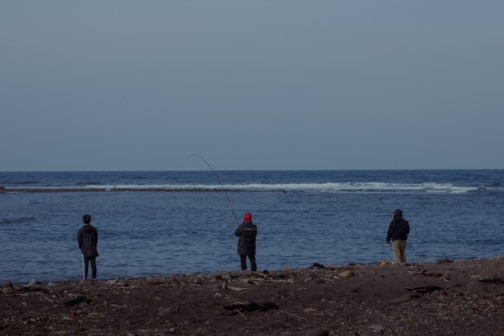 Fishermen & the spectator