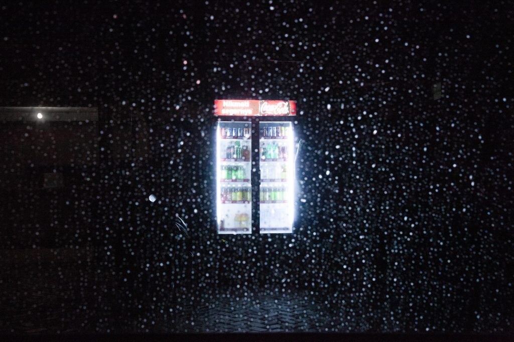 Soft drink fridge in rain