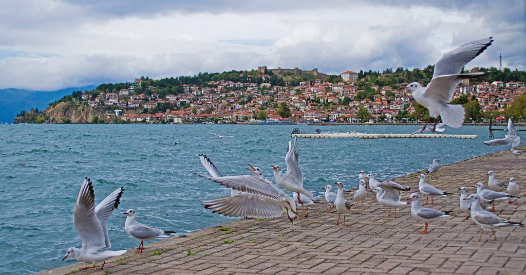 The coast of the Ohrid Lake and the old part of the historical city of Ohrid.